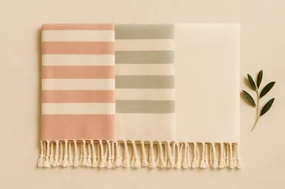 Folded flat-woven turkish peshtemal towels with knotted fringes